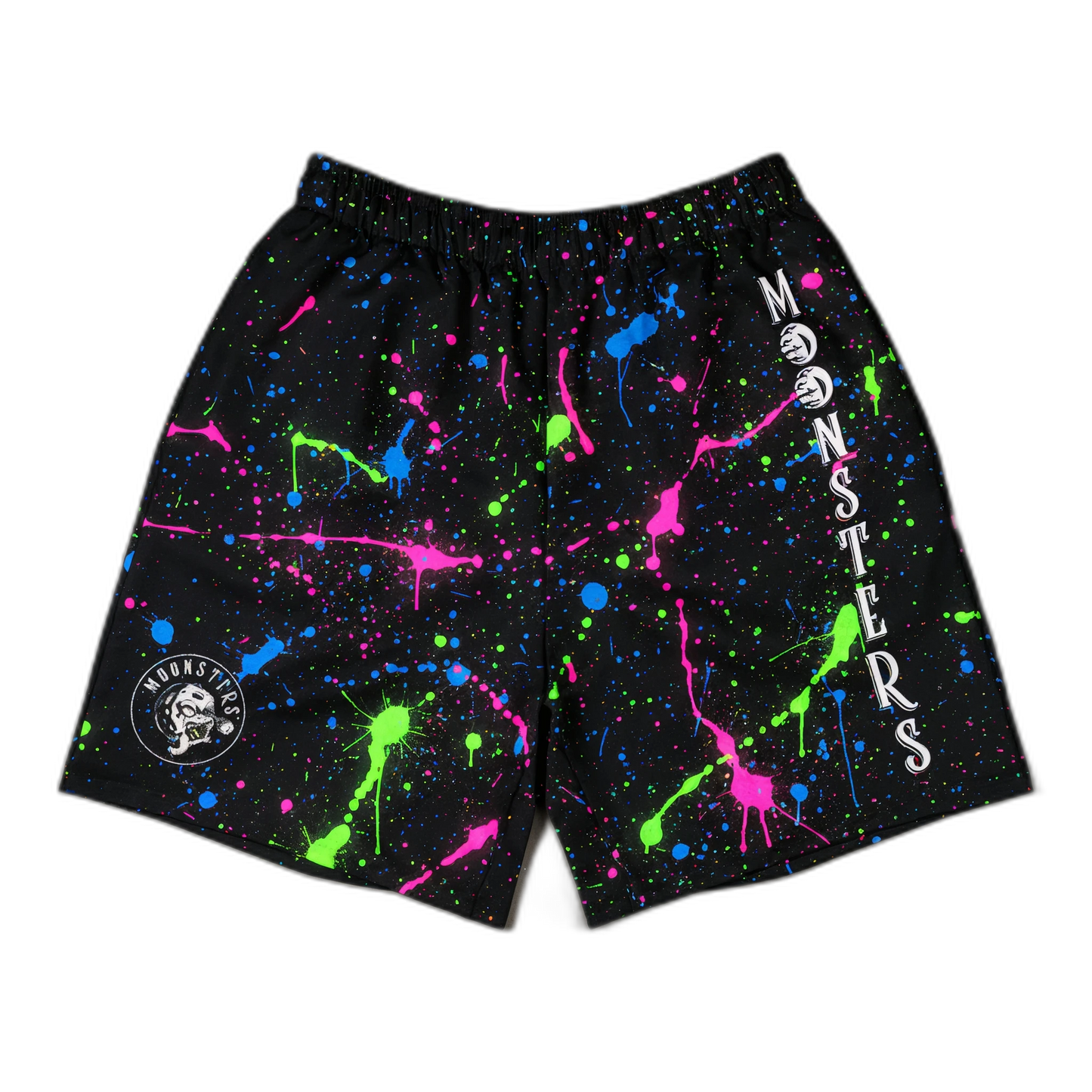 Black shorts with neon green, pink, and blue paint splatter, elastic waistband, and white "MONSTERS" text on right leg.