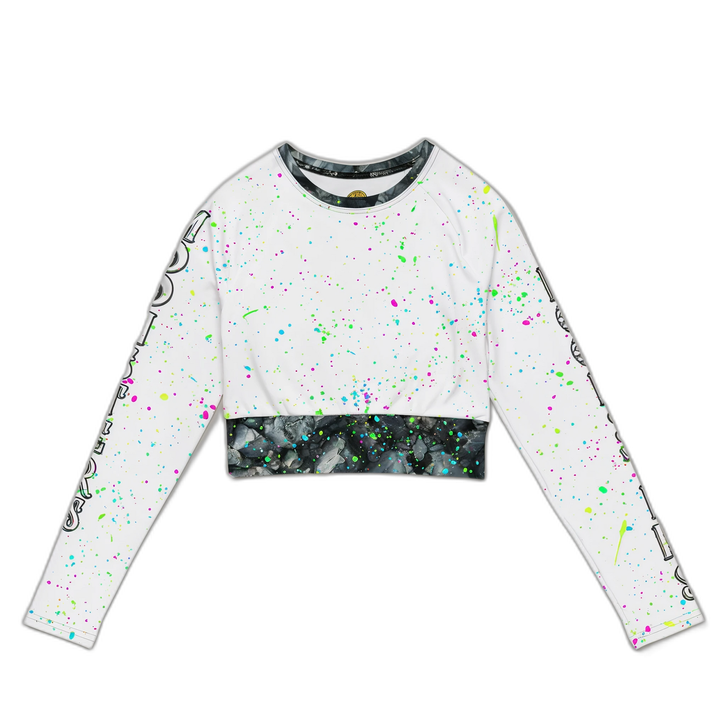 White cropped long-sleeve top with neon paint splatter and black marble-patterned hem and collar trim.