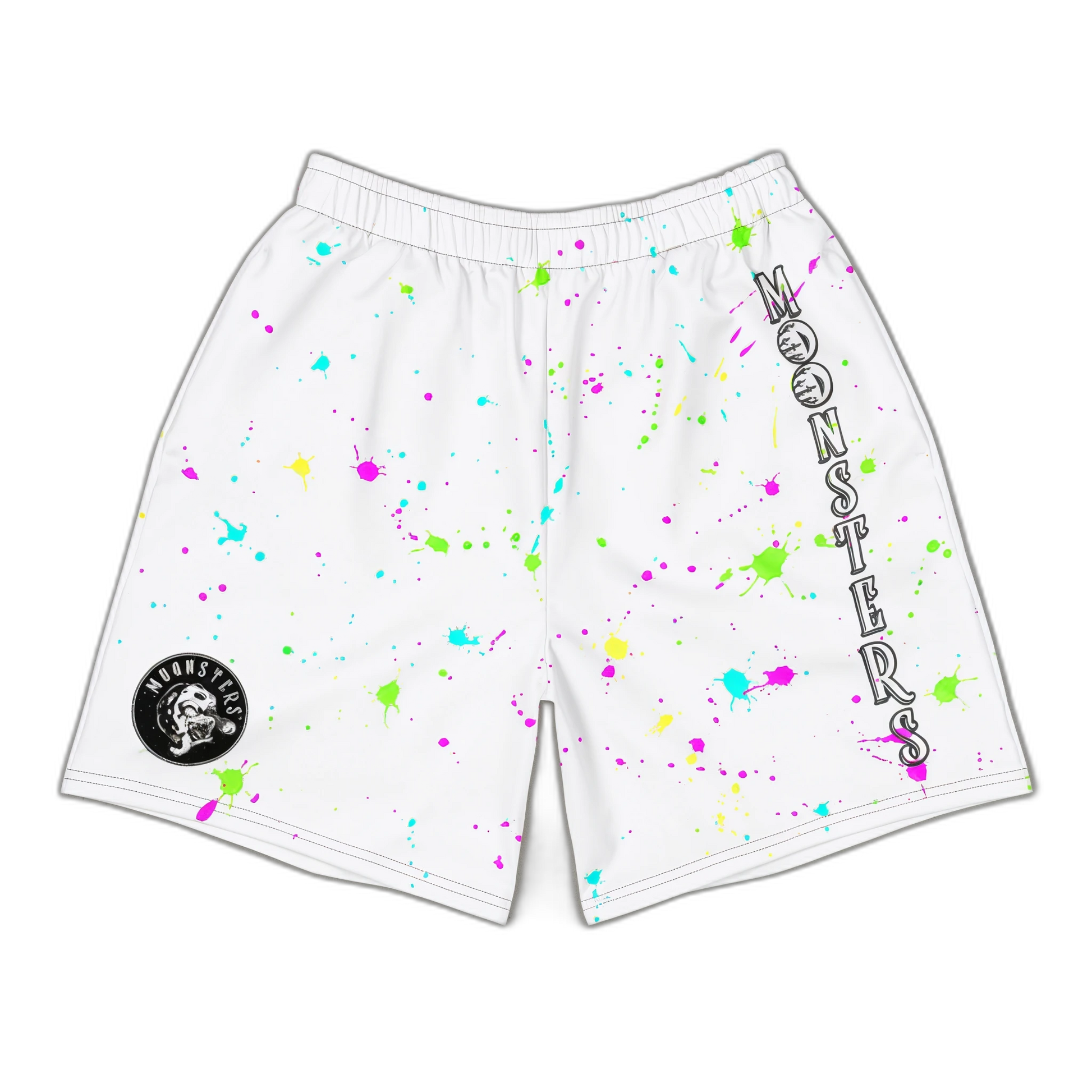 White shorts with neon paint splatters in pink, yellow, green, and blue, elastic waistband, and black circular logo patch on.