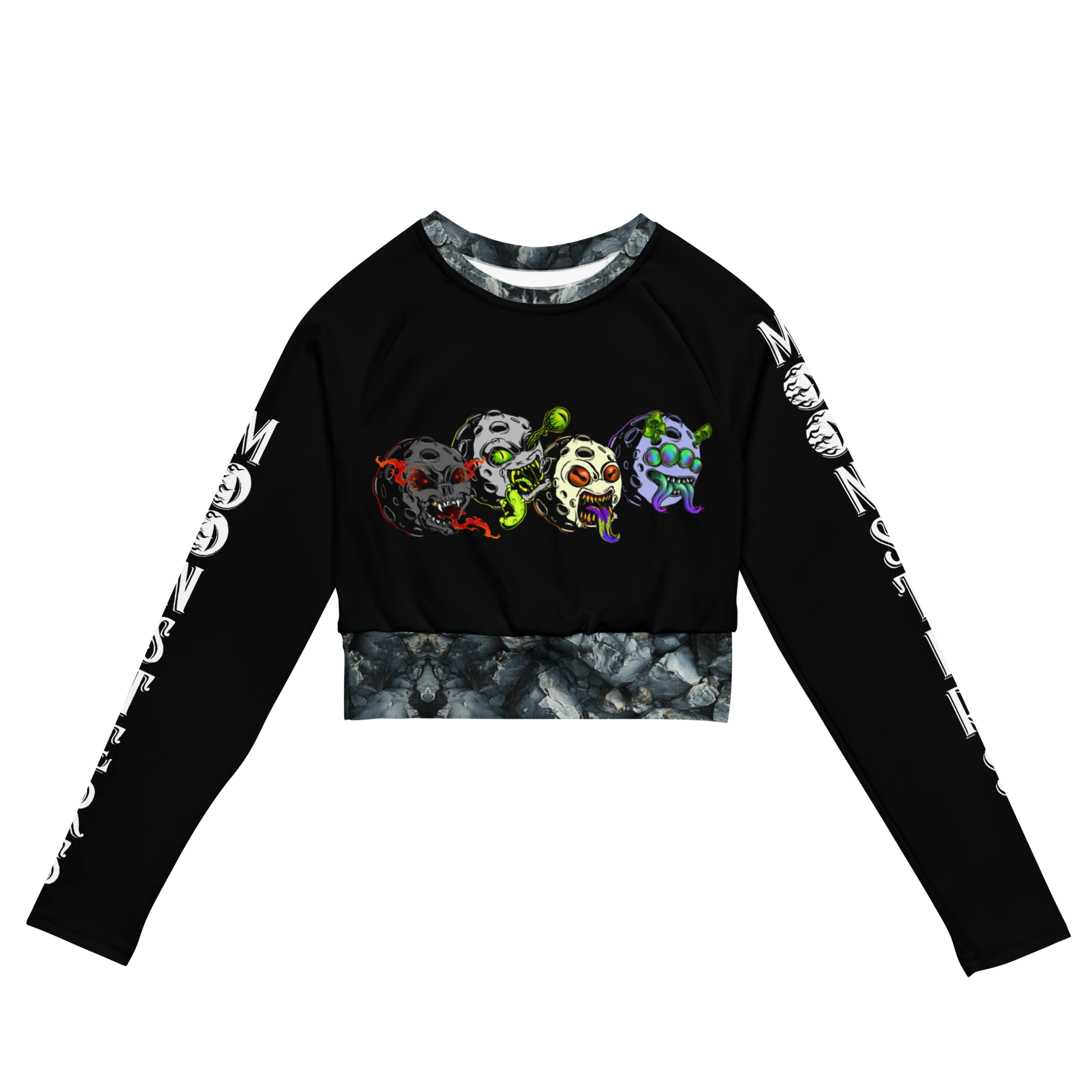 Black long sleeve crop top with colorful Moonsters designs and white text along sleeves.