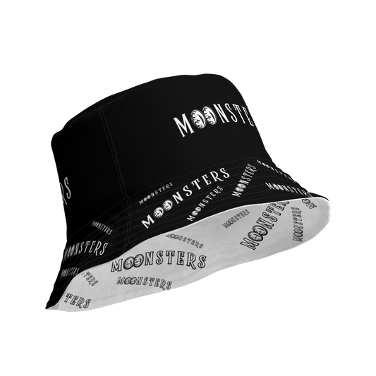 Black and white reversible bucket hat with contrasting "MOONSTERS" text print.