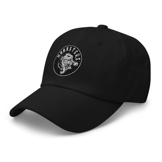 Black dad cap with curved brim and white circular patch featuring a roaring Moonsters logo.